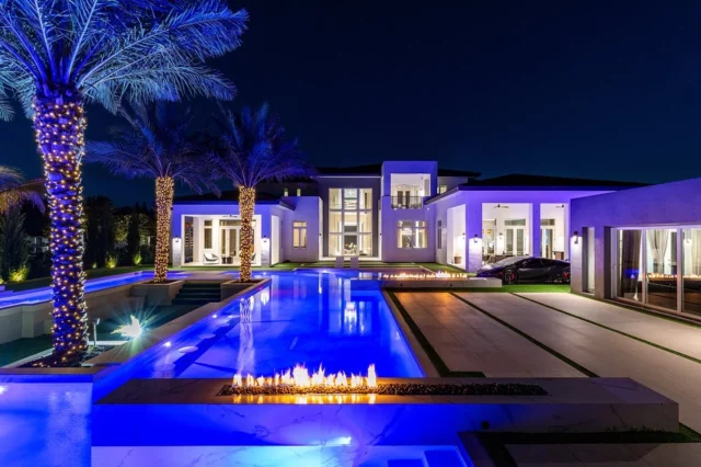 Another Southwest Ranches Listing 👀 | Welcome to this MONUMENTAL CUSTOM ESTATE💥

💰| Offered at: $11,900,000 
📍| 17900 SW 70th Pl, Southwest Ranches, FL 33331
​
Presenting a monumental custom estate in Southwest Ranches, where no detail is overlooked. This 12,000+ sq.ft. architectural marvel, set on 2.25 acres, features 7 lavish bedrooms, 7 exquisite bathrooms, and 2 opulent half-baths, all masterfully crafted with an unrivaled commitment to perfection. Soaring ceilings and walls of glass bathe each room in natural light, highlighting rare stones and rich woods throughout. Inspired by the world’s most elite resorts, this home boasts a sunken entertainment area, a resort-level pool oasis, and a state-of-the-art wellness center with a gym and steam room. Distinctive features include a car showroom theater, a weight-bearing parking area by the pool, and a hidden office overlooking the estate. Schedule a private tour today!
​
📍| 𝗦𝗼𝘂𝘁𝗵𝘄𝗲𝘀𝘁 𝗥𝗮𝗻𝗰𝗵𝗲𝘀, 𝗙𝗟
🛏️| ​ 𝟳 𝗕𝗲𝗱𝗿𝗼𝗼𝗺𝘀
🛁| 𝟳 𝗕𝗮𝘁𝗵𝗿𝗼𝗼𝗺𝘀 | 𝟮 𝗛𝗮𝗹𝗳 𝗕𝗮𝘁𝗵𝗿𝗼𝗼𝗺
📐| ​ 𝟴,𝟳𝟭𝟴 𝗜𝗻𝘁𝗲𝗿𝗶𝗼𝗿 𝗦𝗾𝘂𝗮𝗿𝗲 𝗙𝗲𝗲𝘁 
🌳| 𝗦𝗲𝘁 𝗼𝗻 𝟮.𝟮𝟱 𝗔𝗰𝗿𝗲𝘀
​
Want More Details? 
📲| 305.400.9507
✉️| Info@TheChadCarrollGroup.Com
​
@chadcarroll | @thecarrollgroup | @compassfl