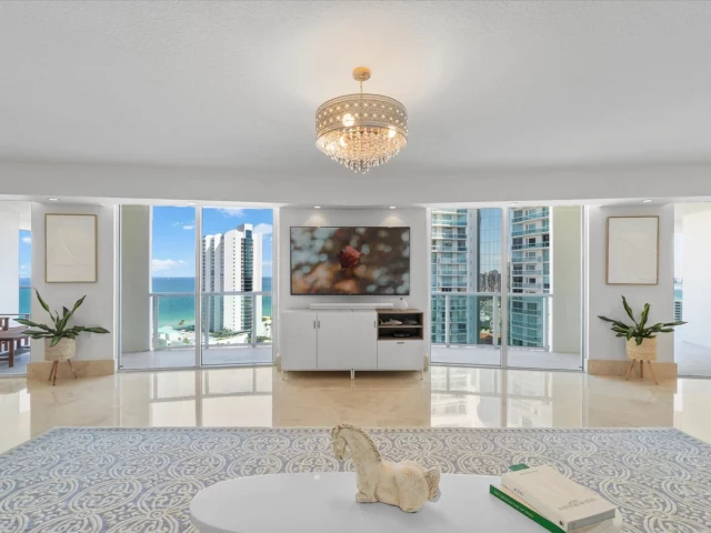 JUST LISTED 🔑 | The Art of Elevation: Oceanfront Living Redefined✨
​
Welcome to.. 200 Sunny Isles Blvd Unit#2-UPH3, Sunny Isles Beach FL 33160📍| Offered at: $1,999,000 
​
Coastal modernism welcomes you to this luminous penthouse spanning nearly 50 feet of direct ocean and Intracoastal frontage, culminating in a 600 sq ft sky-framed terrace. Every room is a portrait of water and light. The 1,500 sq ft great room flows between dual master suites—each a private sanctuary with spa-like en-suites. Marble and wood floors, bespoke millwork, motorized shades, and a European kitchen anchored by SubZero appliances complete this elevated living experience.
​
📍 Sunny Isles Beach, FL
🛏️ 4 Bedrooms
🛁 4 Full Bathrooms | 1 Half Bathroom
📐 3,275 Interior Square Feet
🌊 600 SqFt Sky-Framed Terrace
​
Ready for a private tour?
📲 305.400.9507
📧 Info@TheChadCarrollGroup.com
​
@chadcarroll | @matthewdugow | @thecarrollgroup | @compassfl