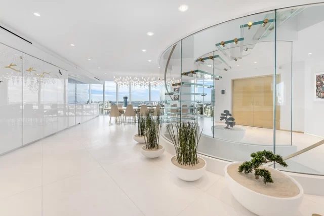 360° of Penthouse Perfection at Portofino Towers✨| Asking: $29,999,999
​
Welcome to 300 S Pointe Dr #PH-5, Miami Beach, FL 33139 📍
​
Experience the pinnacle of luxury in this tri-level penthouse atop the highly coveted Portofino Towers. This nearly 6,000 sqft estate in the sky awaits a visionary seeking the ultimate living experience. Meticulously reimagined with a $9M renovation, every detail has been elevated to perfection, including a stunning floating glass staircase. Offering 360° views of the ocean, skyline, city, and Intracoastal, it is a haven of unparalleled beauty. The private rooftop, complete with a pool and observation deck, crowns this masterpiece in the heart of South of Fifth, Miami’s most exclusive enclave. Designed for those who demand the extraordinary, this residence is a testament to refined opulence and sophisticated living. Seize this generational opportunity today.
​
📍| Miami Beach, FL
🛏️| 4 Bedrooms
🛁| 6 Bathrooms | 1 Half Bathroom
📐| 5,680 Square Feet
🌊| 360° Views of The Ocean, Skyline, City, and Intracoastal
​
Wanting More Details?
📲| 305.400.9507
✉️| Info@TheChadCarrollGroup.Com
​
@chadcarroll | @matthewdugow | @thecarrollgroup | @compassFL