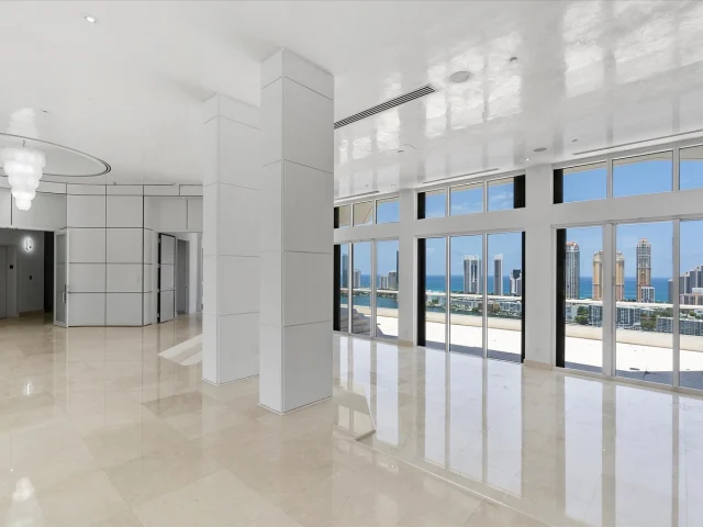 Prestigious Duplex Penthouse at Residence du Cap on Williams Island✨| Asking: $5,500,000
​
2600 Island Blvd #PH-3, Aventura, FL 33160📍
​
Step into a world of rarefied luxury with this prestigious duplex penthouse at Residence du Cap on the coveted Williams Island. Set on a private island surrounded by serene waters and lush landscapes, this architectural gem spans 9,100 sq.ft. of refined interiors and 3,183 sq.ft. of breathtaking terraces. With 6 lavish bedrooms, 8.5 spa-inspired bathrooms, a private library, den, and staff quarters, every detail exudes sophistication. The grand great room features soaring 14-foot ceilings, while the chef’s kitchen rivals the finest culinary spaces. The master suite boasts dual baths, an indoor-outdoor shower, and expansive walk-ins. Private elevators, including a striking glass hydraulic lift, lead to a rooftop oasis with a pool and spa. Images are renderings. Schedule a tour today!
​
📍| Aventura, FL
🛏️| 6 Bedrooms
🛁| 8 Bathrooms | 1 Half Bathroom
📐| ​ 9,100 Interior SF | 12,283 Total SF
🛥| ​ Rooftop Oasis with Pool & Spa
​
Want More Details? 
📲| 305.400.9507
✉️| Info@TheChadCarrollGroup.Com
​
 @chadcarroll | @thecarrollgroup | @compassfl