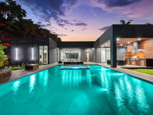 JUST LISTED! | A Bold New Build Redefining Luxury in Biscayne Heights ✨ 
​
Welcome to… 871 NE 83rd St, Miami, FL 33138 📍
​
A bold fusion of architectural elegance and tropical luxury, this brand-new estate in exclusive Biscayne Heights offers a lifestyle of rare distinction. Inside, soaring 12-ft ceilings and walls of glass flood the space with natural light, highlighting refined organic finishes throughout. Featuring 5 bedrooms, 5.5 bathrooms, a private studio, and maid’s suite, the home is thoughtfully designed for elevated living. The chef’s kitchen stuns with a Wolf gas range, Sub-Zero refrigeration, wine fridge, marble countertops, and a built-in Wolf espresso machine. A full Savant system controls lighting, climate, and security. Outside, escape to a Bali-inspired oasis with a saltwater pool, Bali stone spa, Ipe wood deck, fully covered summer kitchen, and a cabana bath—perfect for elevated entertaining.
​
📍| Miami, FL
🛏️| 5 Bedrooms
🛁| 5 Bathrooms | 2 Half Bathrooms
📐| 4,079 Interior Square Feet | 7,284 Total Square Feet
🌊| Expansive Private Terraces with Southeast Ocean Views
​
Want More Details?
📲| 305.400.9507
✉️| Info@TheChadCarrollGroup.Com
​
@chadcarroll | @bookofeli_f | @thecarrollgroup | @compassfl